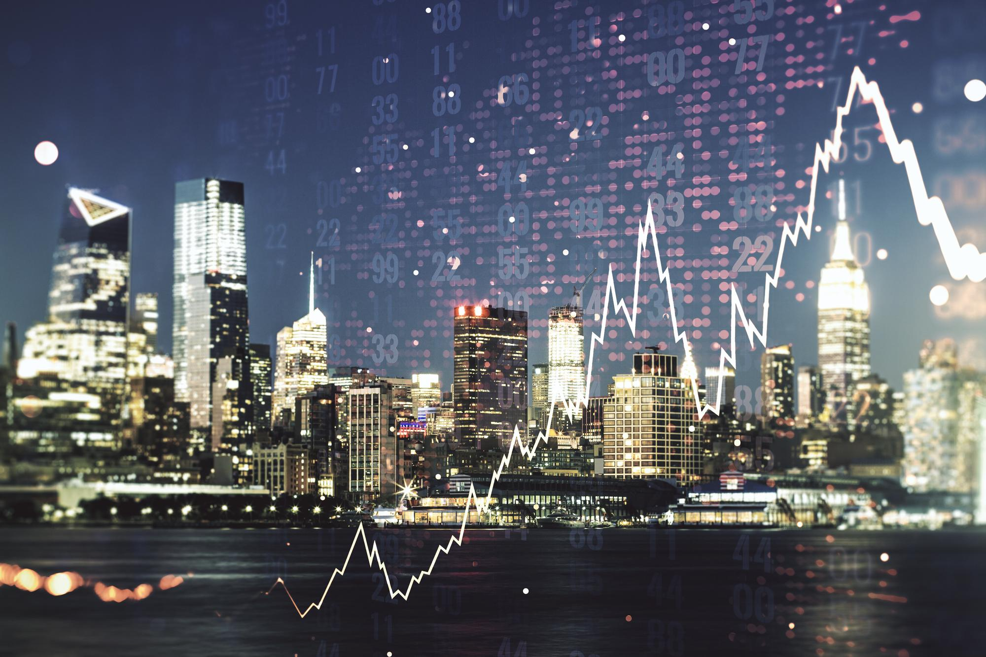 City skyline with financial chart overlay